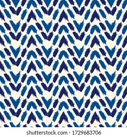 Ethnic seamless pattern. Freehand horizontal zigzag chevron stripes print. Boho chic design background. Indigenous, tribal style wallpaper. Brush strokes, handdrawn geometric ornament. Vector abstract