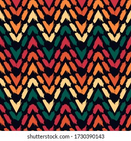 Ethnic seamless pattern. Freehand horizontal zigzag chevron stripes print. Boho chic design background. Indigenous, tribal style wallpaper. Brush strokes, handdrawn geometric ornament. Vector abstract