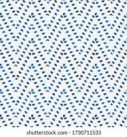 Ethnic seamless pattern. Freehand horizontal zigzag chevron stripes print. Boho chic design background. Indigenous, tribal style wallpaper. Brush strokes, handdrawn geometric ornament. Vector abstract