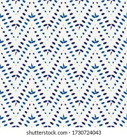 Ethnic seamless pattern. Freehand horizontal zigzag chevron stripes print. Boho chic design background. Indigenous, tribal style wallpaper. Brush strokes, handdrawn geometric ornament. Vector abstract