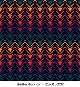 Ethnic seamless pattern. Freehand horizontal zigzag chevron stripes print. Boho chic design background. Indigenous, tribal style wallpaper. Brush strokes, handdrawn geometric ornament. Vector abstract