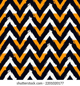 Ethnic seamless pattern. Freehand zigzag stripes print. Boho chic design background. Tribal wallpaper. Brush wavy lines. Handdrawn geometric ornament. Chevron backdrop. Indigenous image