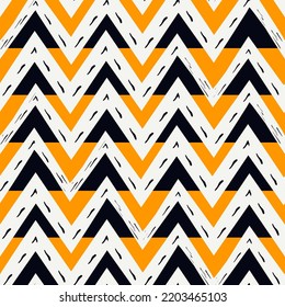 Ethnic seamless pattern. Freehand zigzag stripes print. Boho chic design background. Tribal wallpaper. Brush wavy lines. Handdrawn geometric ornament. Chevron backdrop. Indigenous image.