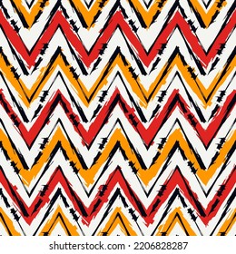 Ethnic seamless pattern. Freehand zigzag stripes print. Boho chic design background. Tribal wallpaper. Brush wavy lines. Handdrawn geometric ornament. Chevron backdrop. Indigenous image