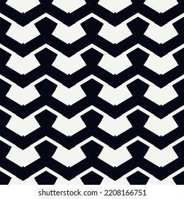 Ethnic seamless pattern. Freehand zigzag stripes print. Boho chic design background. Tribal style wallpaper. Brush wavy lines. Handdrawn geometric ornament. Chevron backdrop. Indigenous image.