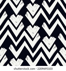 Ethnic seamless pattern. Freehand zigzag stripes print. Boho chic design background. Tribal wallpaper. Brush wavy lines. Handdrawn geometric ornament. Chevron backdrop. Indigenous image. Vector art.