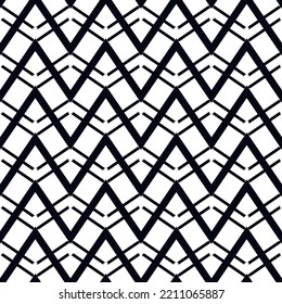 Ethnic seamless pattern. Freehand zigzag stripes print. Boho chic design background. Tribal wallpaper. Brush wavy lines. Handdrawn geometric ornament. Chevron backdrop. Indigenous image