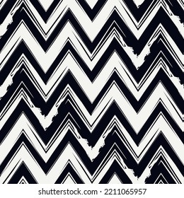 Ethnic seamless pattern. Freehand zigzag stripes print. Boho chic design background. Tribal wallpaper. Brush wavy lines. Handdrawn geometric ornament. Chevron backdrop. Indigenous image.