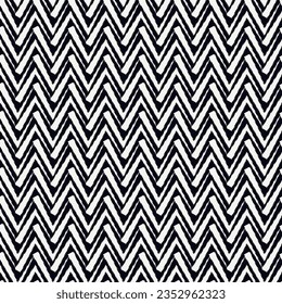 Ethnische nahtlose Muster. Frische Zickzack-Streifen bedruckt. Boho chic Design Hintergrund. Tapete im Stile eines Stammes. Pinselförmige Linien. Handgezeichnete geometrische Ornamente. Chevron Hintergrund. Indigenes Bild.
