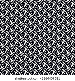 Ethnic seamless pattern. Freehand zigzag stripes print. Boho chic design background. Tribal style wallpaper. Brush wavy lines. Handdrawn geometric ornament. Chevron backdrop. Indigenous image.