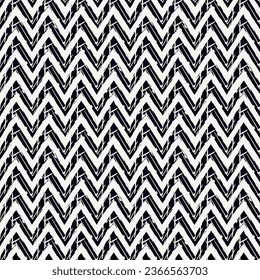 Ethnic seamless pattern. Freehand zigzag stripes print. Boho chic design background. Tribal style wallpaper. Brush wavy lines. Handdrawn geometric ornament. Chevron backdrop. Indigenous image