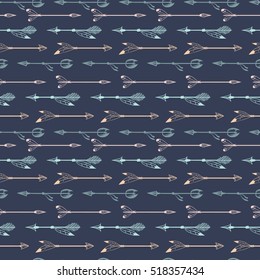 Ethnic seamless pattern with hand drawn arrows with feathers vector