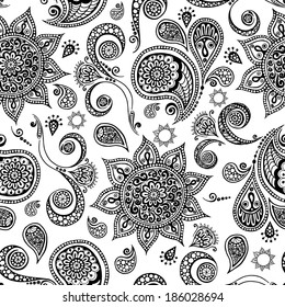Ethnic seamless pattern with mandala, cucumbers and paisley. Round Ornament Pattern. Ornamental Flowers.