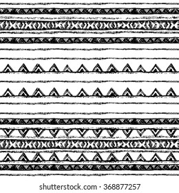 Ethnic seamless pattern in native style. Tribal vector seamless pattern with native American Indian symbols. Boarder wigwam pattern. Hand-drawn indian background vector. Native american tent pattern
