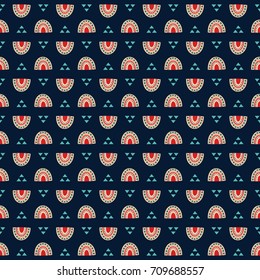 Ethnic seamless pattern on dark blue background. Fashion abstract geometric design for textile, decor, fabric, wallpaper, decor.