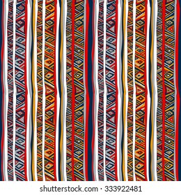 Ethnic seamless pattern. Traditional folk ornament, pattern of triangles, stripes, diamonds and zigzags, painted by hand. Pattern for design background, packaging, wallpaper, fabrics, textiles.