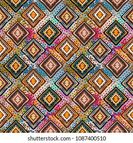 Ethnic seamless pattern. Tribal art boho print. Abstract geometric background texture. Paint spots