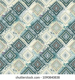Ethnic seamless pattern. Tribal art boho print. Abstract tiled geometric background texture. Paint spots