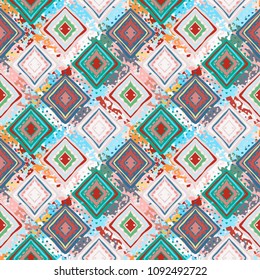 Ethnic seamless pattern. Tribal art boho print. Abstract tiled geometric background texture. Paint spots