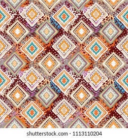 Ethnic seamless pattern. Tribal art boho print. Abstract tiled geometric background texture. Paint spots