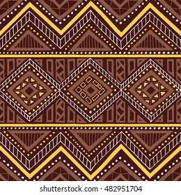 Ethnic seamless pattern. Tribal motifs. Geometric ornament painted by hand. Brown and yellow colors. Vector illustration.