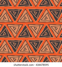 Ethnic seamless pattern. Tribal triangles seamless orange background