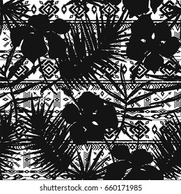Ethnic seamless  pattern with tropical leaves and flowers. Vector hand draw background.