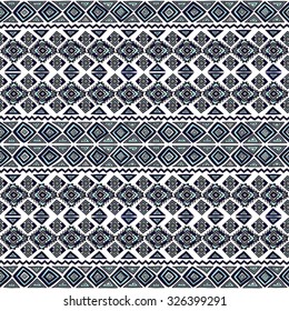 Ethnic seamless pattern for your design. The traditional structure of folk forms. Triangles, diamonds, stripes, zigzags, painted by hand.