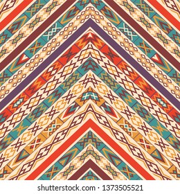 Ethnic seamless pattern, zigzag ornament. Colourful vector wallpaper, textile print.