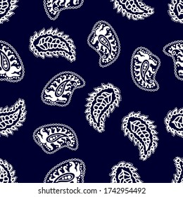Ethnic seamless print with floral motifs. Abstract pattern with paisley elements. Man fashion textile collection. White on dark blue background.