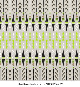 Ethnic seamless vector pattern. Aztec beige and green fabric design with geometric shape elements.