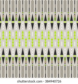Ethnic seamless vector pattern. Aztec beige and green fabric design with geometric shape elements.