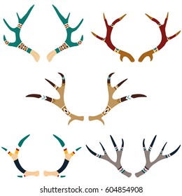 Ethnic set of antlers isolated on white background. Hand drawn collection of deer horns decorated with geometric ethnic ornament. Vector antler icons design