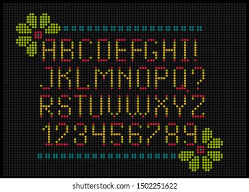 Ethnic style romantic colorful embroidered alphabet. Letters cross-stitch pattern. Scandinavian winter folk design. Christmas wish text elements.