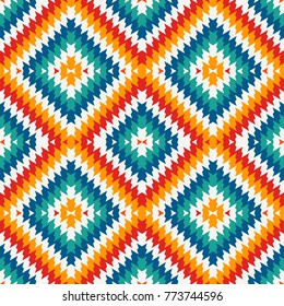 Ethnic style seamless pattern with chevron lines. Native americans ornamental background. Tribal motif. Colorful mosaic wallpaper. Boho chic digital paper, textile print, page fill. Vector art