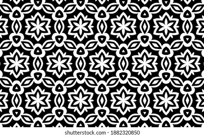 Ethnic stylish black and white pattern. Geometric background of flowers in traditional folk style for coloring, wallpaper, textiles.