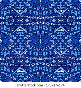 Ethnic textile oriental pattern with blue ornament arabesque. Geometric design surface fabric print