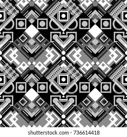 Ethnic theme. For textile, wallpaper, wrapping paper. Hand drawn seamless pattern. Vector tribal design in white, gray and black colors. Zigzag and stripe line, rhombus and tiles.