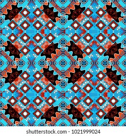 Ethnic theme. Zigzag and stripe line, rhombus and tiles. Vector tribal design in blue, black and red colors. Hand drawn seamless pattern. For textile, wallpaper, wrapping paper.