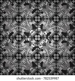 Ethnic theme. Zigzag and stripe line, rhombus and tiles. For textile, wallpaper, wrapping paper. Vector tribal design in gray, black and white colors. Hand drawn seamless pattern.