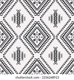 Ethnic tribal black and white pattern. Vector ethnic tribal aztec Navajo geometric diamond shape seamless pattern background. Southwest geometric pattern for fabric, home interior decoration elements.