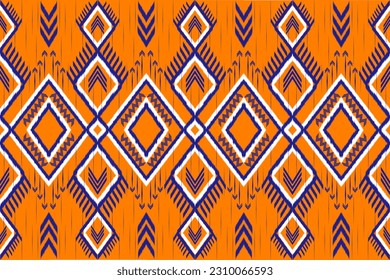 The ethnic tribal fabric pattern showcases a mesmerizing blend of vibrant colors and intricate geometric graphics. This visually captivating design is deeply rooted in the cultural heritage of various