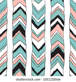 Ethnic and tribal geometrical seamless pattern. Striped simple background in bohemian style. Chevron grunge pattern, hipster style