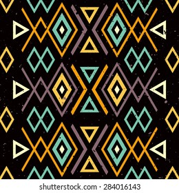 Ethnic tribal seamless background with grunge effect. African traditional pattern. It can be used for wallpaper, pattern fills, web page background,surface textures.