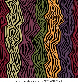 Ethnic tribal style vertical jagged stripes. Seamless abstract multicolored geometric pattern. Yellow, green, and red on a black background. Vector illustration for textile, wrapping, print, and web.