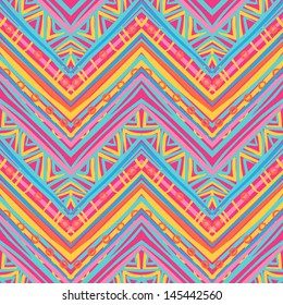 Ethnic zigzag pattern in retro colors, African style seamless vector background