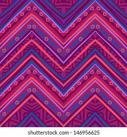 Ethnic zigzag pattern in retro colors, African style seamless vector background