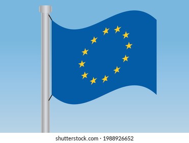 
EU flag blowing in the wind over blue sky with metallic flagpole
