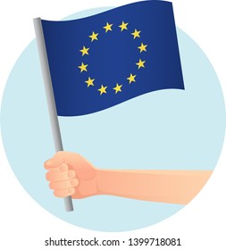 EU flag in hand. Patriotic background. Europe flag vector illustration