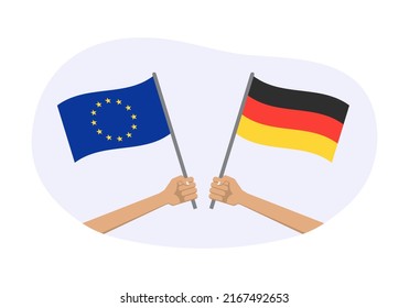 EU and Germany flags. German and European Union symbols. Hand holding waving flag. Vector illustration.